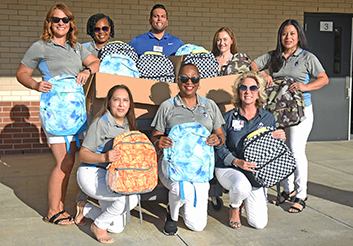  Costco donates backpacks to McFee Elementary School